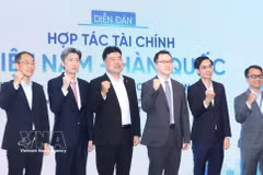 出席论坛的代表们。图自越通社