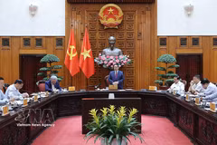 越南政府总理范明政在会议上发表讲话。图自越通社