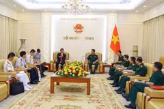 会见现场。图自越通社