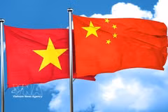 两国国旗。图自越通社