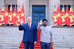越共中央总书记、国家主席苏林与斯里兰卡总统阿努拉·库马拉·迪萨纳亚克。图自越通社