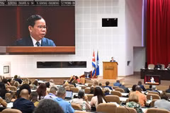 越南最高人民检察院副检察长谢光凯在会议上发言。图自越通社