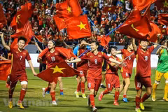 越南国家主席阮春福向在第31届东运会上取得优异成绩的运动员授予劳动勋章