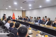 会议场景。图自越通社