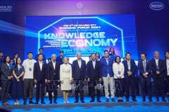 与会代表合影。图自越通社