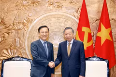  越共中央总书记、国家主席苏林会见韩国国土交通部长官金允德。图自越通社