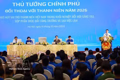 越共中央政治局委员、政府总理黎明兴在对话会上发表讲话。图自越通社