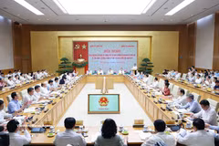 国会党委常委会与政府党委常委会关于第十六届国会第二次会议内容和议程的会议现场。图自越通社