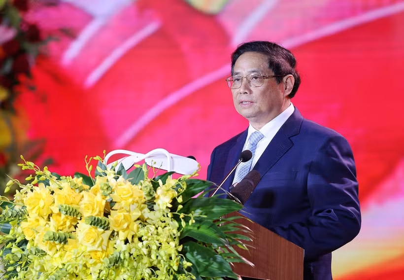 越南政府总理范明政发表讲话。图自越通社