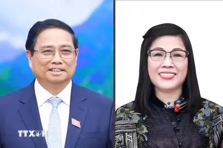 政府范明政和夫人。图自越通社