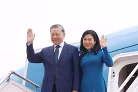 越共中央总书记苏林和夫人。图自越通社