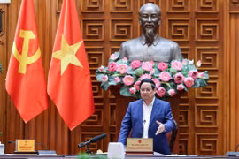 越南政府总理范明政发表讲话。图自越通社