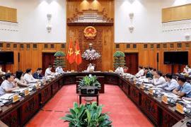 会议场景。图自越通社