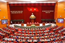 第十三届中央委员会第十一次全体会议场景。图自越通社