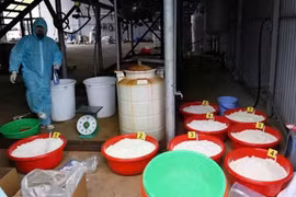 制毒工厂现场。图自越通社
