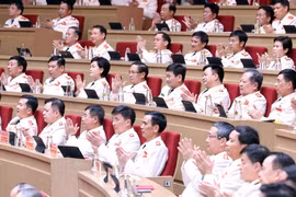 与会代表。图自越通社