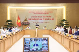 会议现场。图自越通社