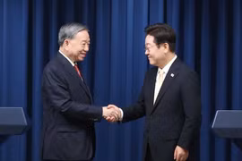 越共中央总书记苏林与韩国总统李在明。图自越通社