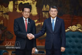 政府总理黎明兴会见老挝中央检查委员会主任、国家监察总署署长万赛。图自越通社