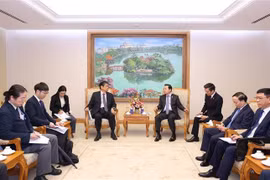 越南政府副总理陈红河在政府总部会见了日本驻越南大使伊藤直树。图自越通社
