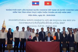 越老两国跨部门协调组代表签署工作会议纪要。图自工贸部