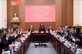会见现场。图自越通社