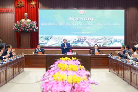 会议场景。图自越通社