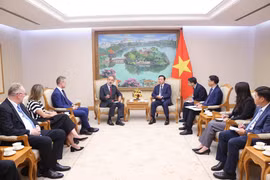 会见现场。图自越通社