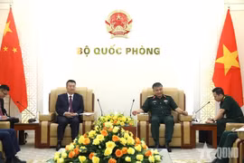 阮文贤上将会见中国公安部部长助理吕武钦。图自人民军报