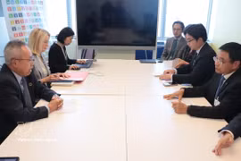 会见现场。图自越通社