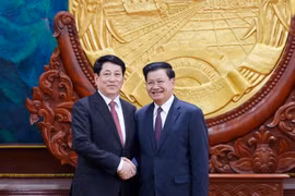 越南国家主席梁强同老挝总书记、国家主席通伦·西苏里举行会谈。图自越通社