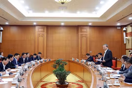 工作座谈场景。图自越通社