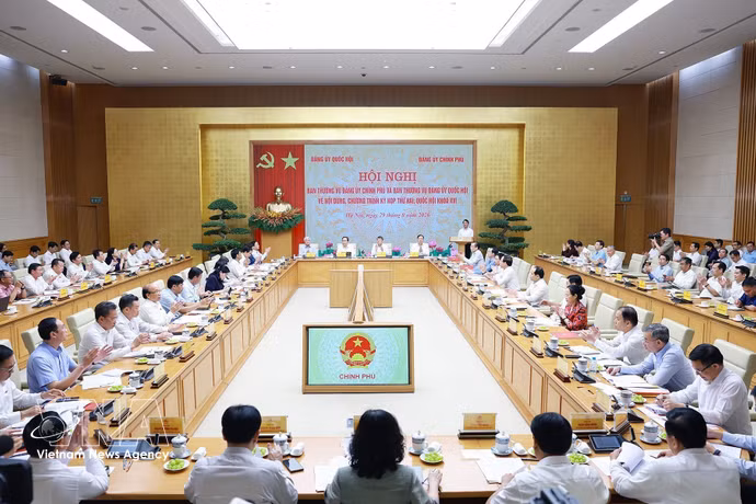 国会党委常委会与政府党委常委会关于第十六届国会第二次会议内容和议程的会议现场。图自越通社