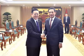 越南政府副总理兼国防部长潘文江会见东盟秘书长高金洪。图自baochinhphu.vn