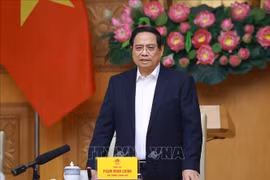 政府总理范明政主持 “光中战役”部署会议。图自越通社