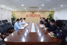 双方会见场景。图自越通社