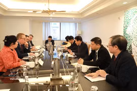 会见现场。图自越通社