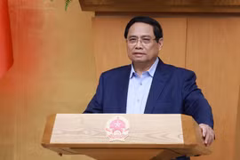 范明政总理主持政府关于越南国际金融中心专题会议。图自越通社