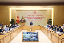 会议场景。图自越通社