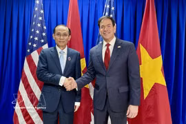 越共中央政治局委员、越南外交部长黎怀忠与美国国务卿马尔科·鲁比奥。图自越通社
