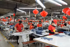 北宁省出口服装生产线。图自越通社
