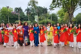越南妇女始终是凝聚民族力量的重要组成部分。图自越通社