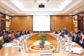 会议场景。图自越通社