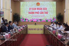 会见现场。图自越通社