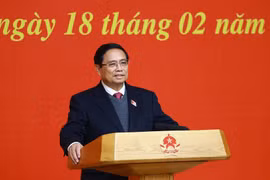 政府总理范明政发表讲话。图自越通社