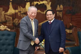 越南政府总理范明政会见中国太平洋建设集团创始人严介和。图自越通社