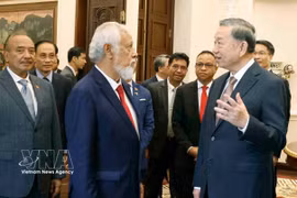 越共中央总书记、国家主席苏林和东帝汶总理夏纳纳·古斯芒。图自越通社