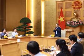 越南政府总理范明政在政府驻地主持召开越南数据平台发展会议。图自越通社