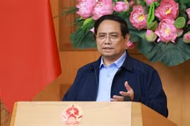 越南政府总理范明政发表讲话。图自越通社