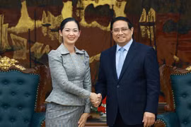 越南总理范明政会见柬埔寨商业部长占尼莫。图自越通社